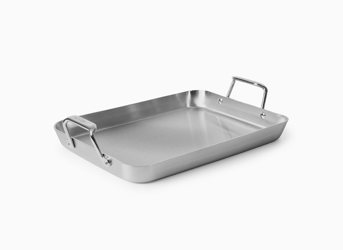 A silver stainless steel roasting pan with handles, displayed on a white background.
