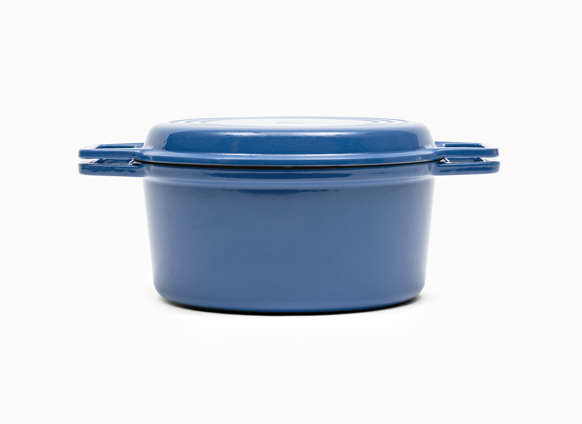 Blue Misen Dutch Oven covered by Grill Lid.