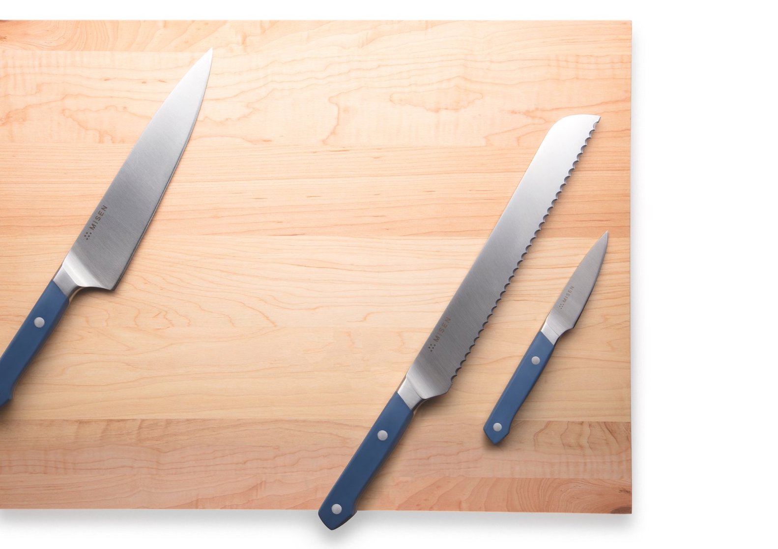 Good knife set: the Misen three-piece knife set on a cutting board