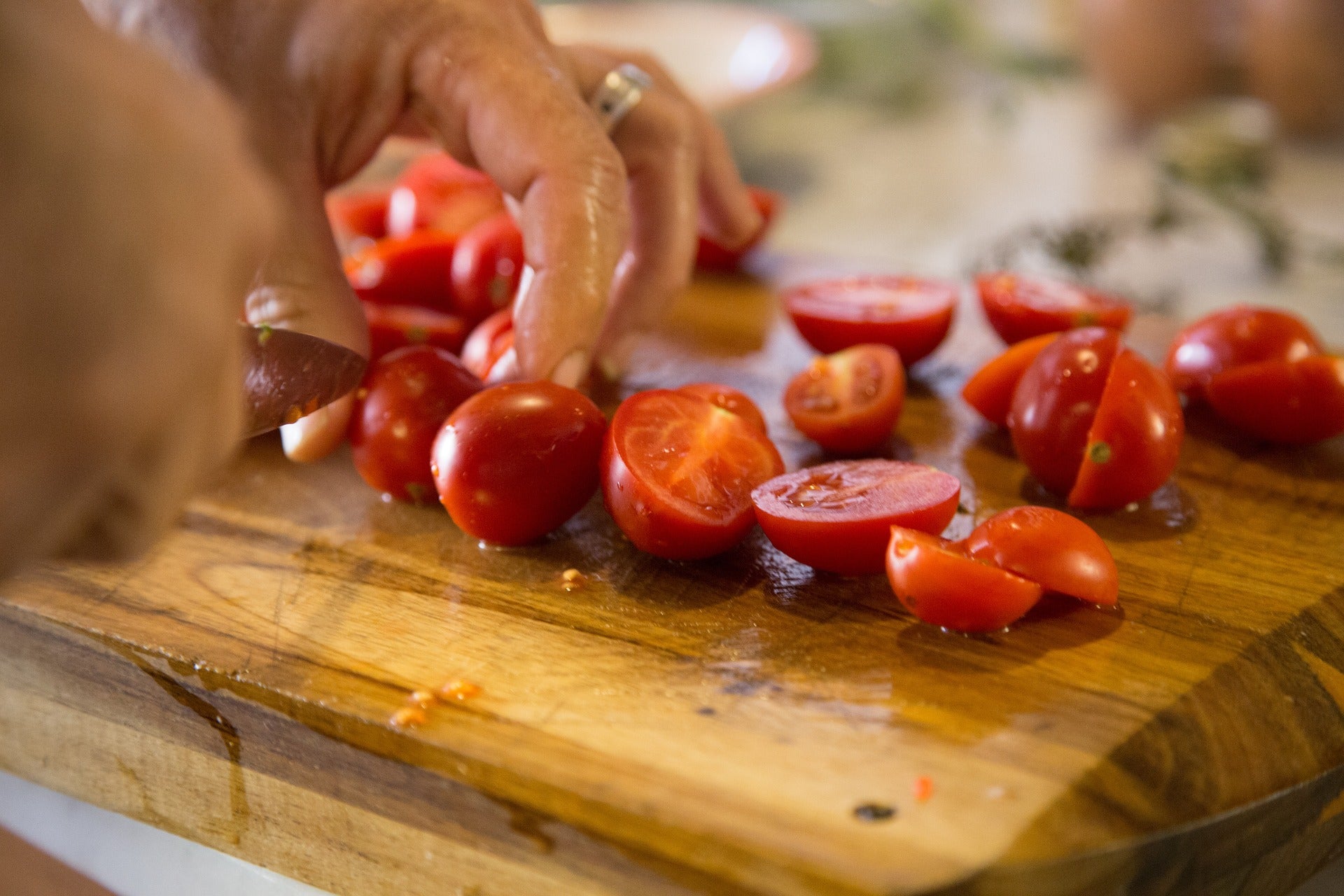 Best wood for cutting board: sliced tomatoes on a cutting board