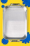 A rectangular Misen stainless steel roasting pan, viewed from above, with rounded corners and metal handles on the short sides. The pan is set against a vibrant yellow background and partially surrounded by blue silicone pan protectors.