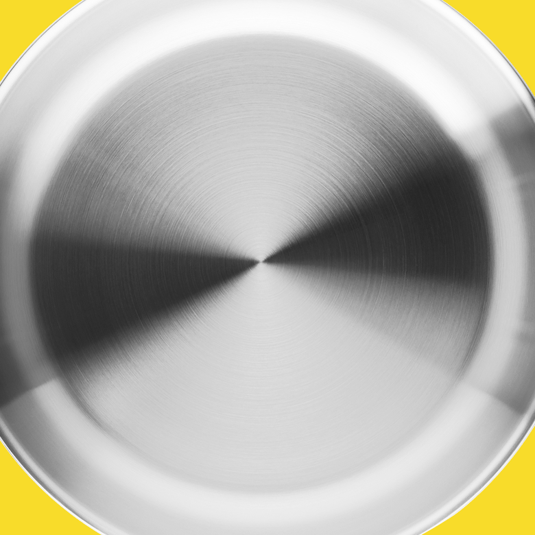Brushed stainless steel bowl interior with radial polish finish