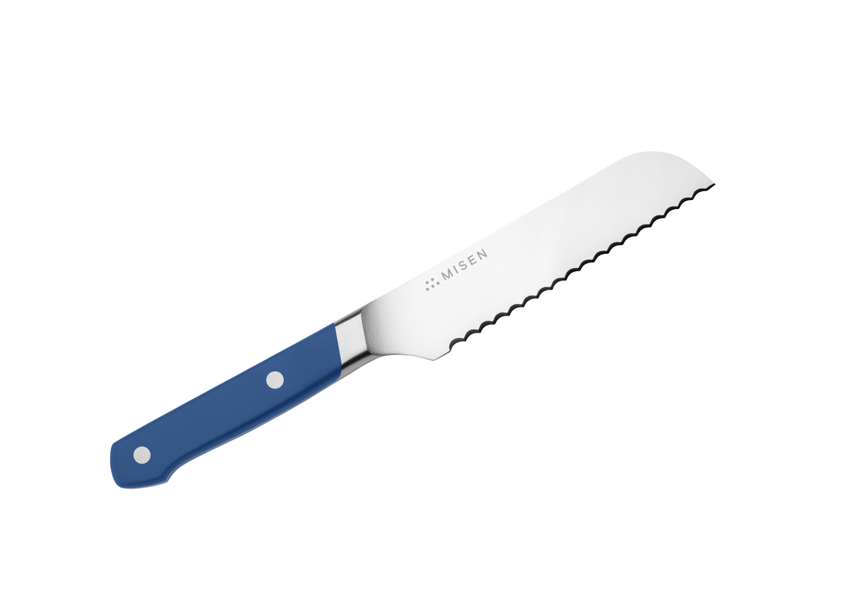 The blue Misen Short Serrated Knife on a white background.