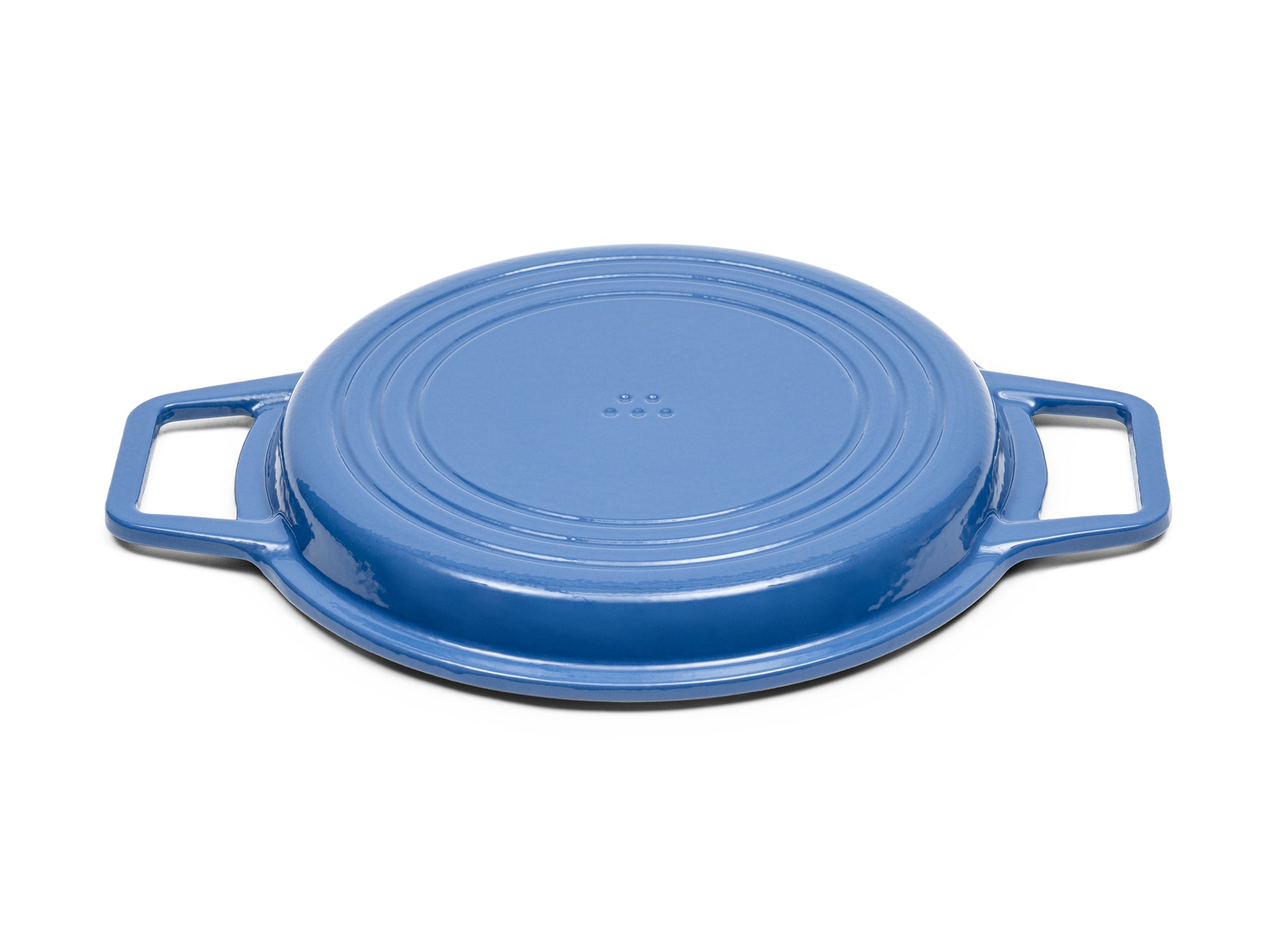 Blue Grill Lid for 7-quart Dutch oven face down on white background.