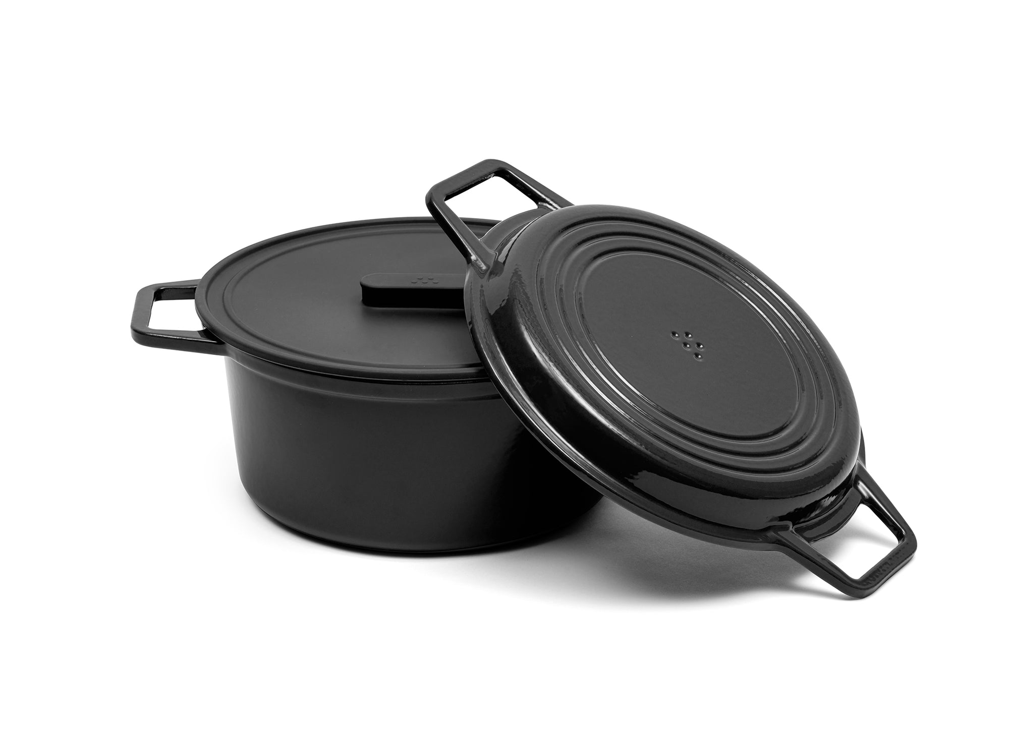 A black 7-quart Misen Dutch Oven with matching Grill Lid and silicone Universal Lid.