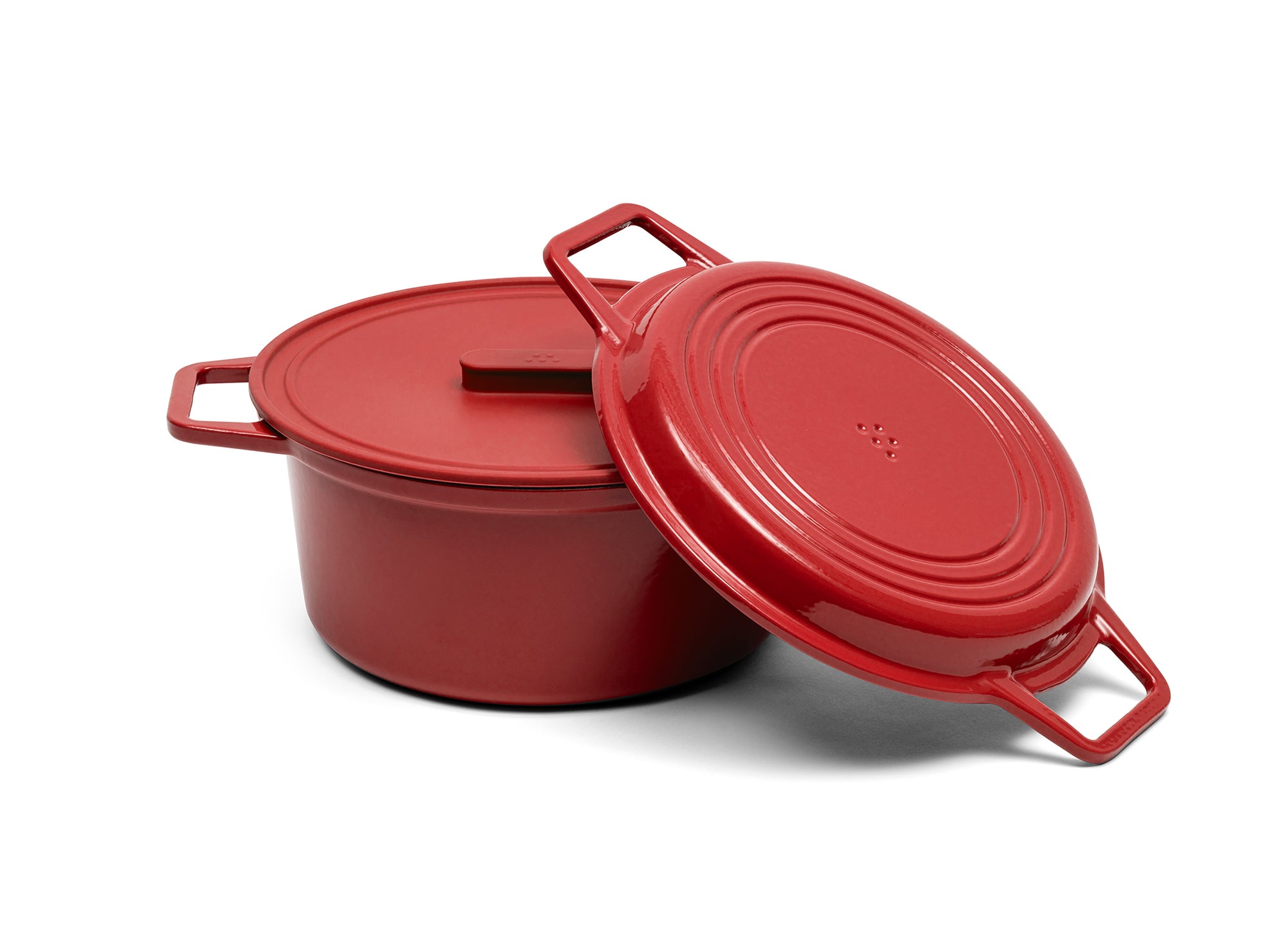 A red 7-quart Misen Dutch Oven with matching Grill Lid and silicone Universal Lid.