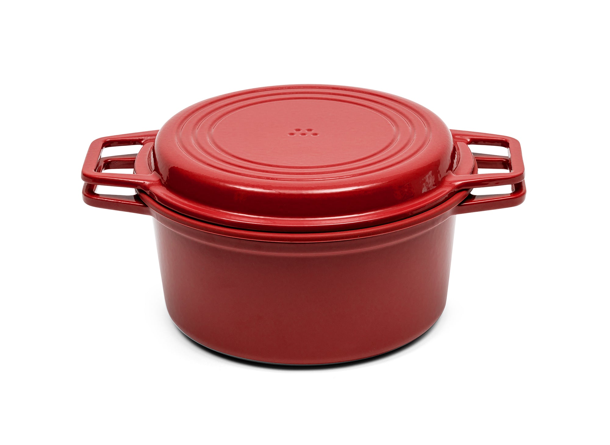 A red 7-quart Misen Dutch Oven covered by matching Grill Lid.