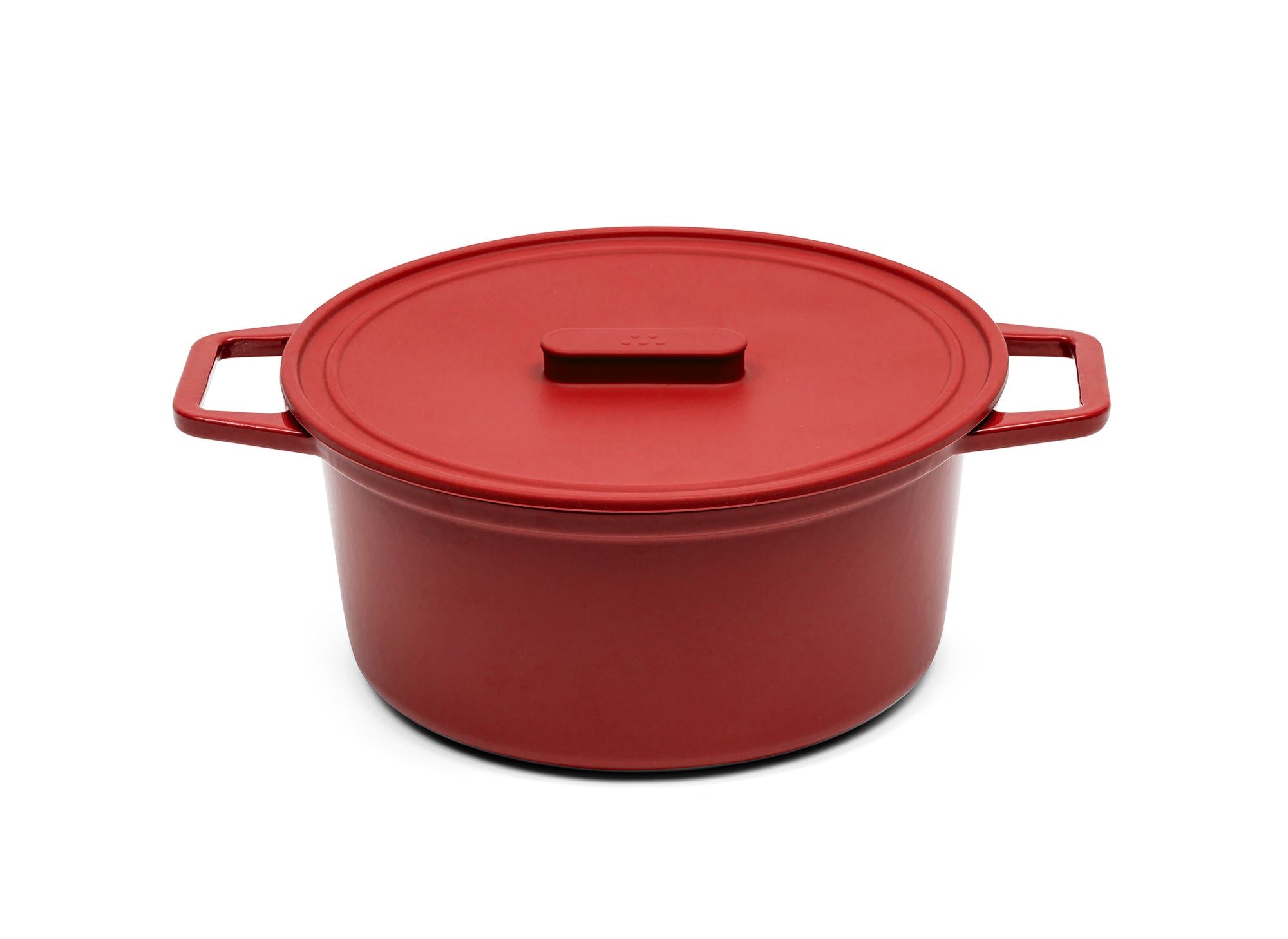 A red 7-quart Misen Dutch Oven with matching silicone Universal Lid.