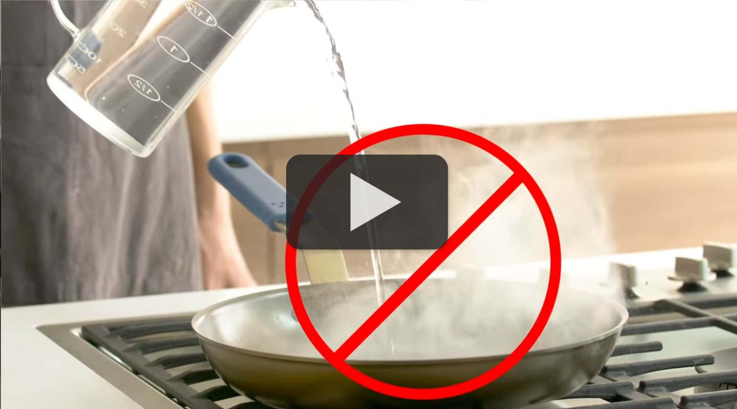 Warning: do not pour water into a hot pan on gas stove