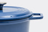 Right side of blue Misen Dutch Oven with Traditional Lid on white background.