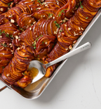 Roasted sweet potato gratin with thyme and pecans in Misen stainless steel pan