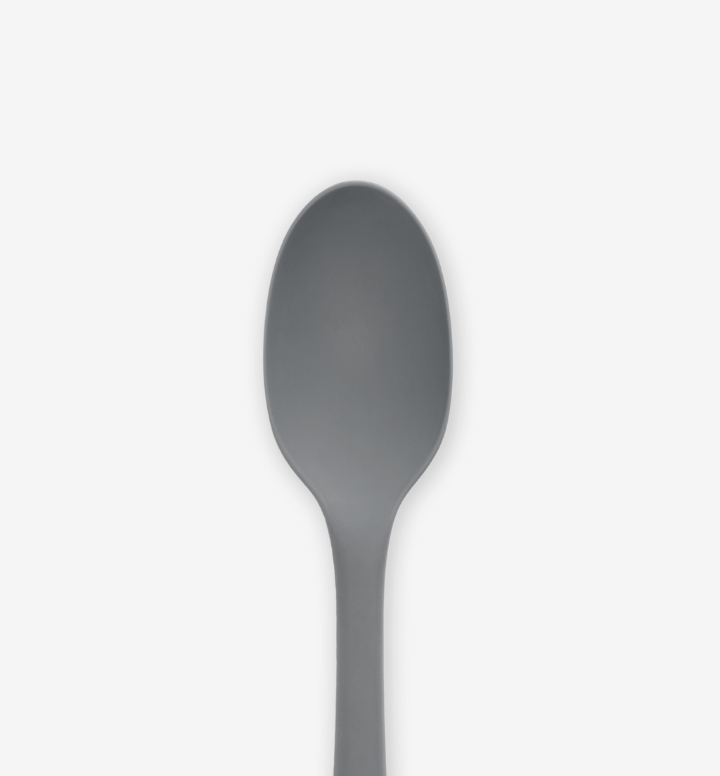 Gray silicone spoon close-up showing oval bowl and handle