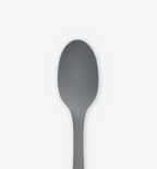 Gray silicone spoon close-up showing oval bowl and handle