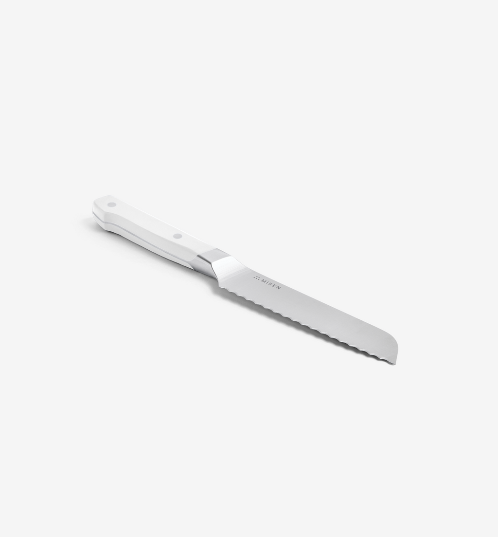 Misen serrated bread knife with white handle and stainless steel blade