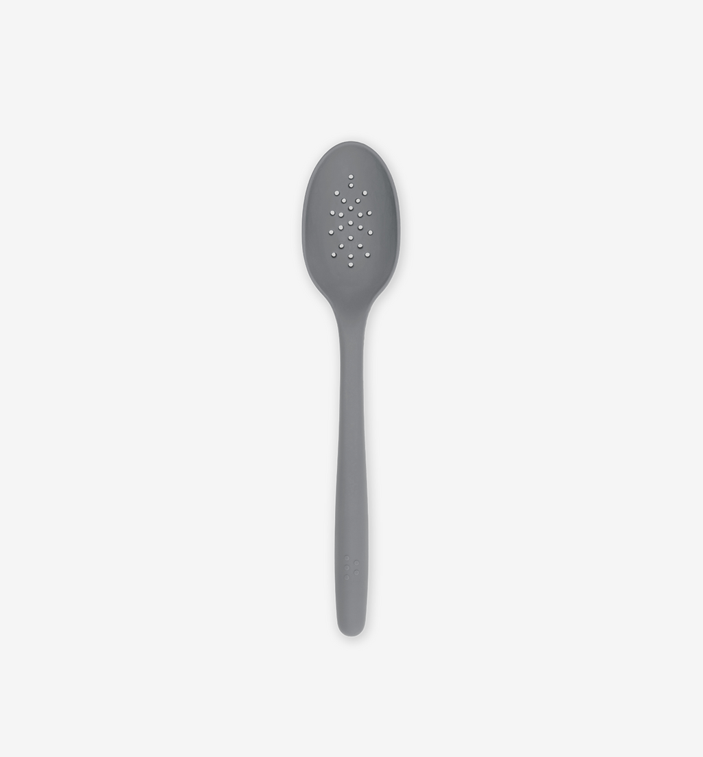 Gray silicone slotted spoon with perforated bowl and long handle