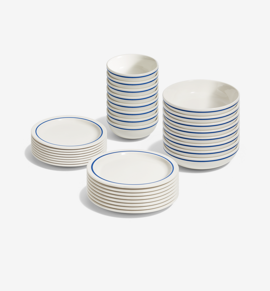 32-piece blue dinnerware set with plates, salad plates, pasta bowls, and cereal bowls