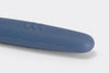 A close view of a Blue Misen Mixing Spoon’s silicone handle, with raised Misen logo visible.