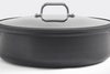 A front-facing, zoomed-in view of the Misen Nonstick Rondeau with lid on, on a white background. The center of the pan is most clearly visible.