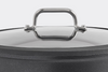 A zoomed-in view of the Misen 8 QT Nonstick Stockpot, with lid on, on a white background. The lid’s handle is most clearly visible.