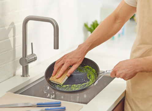 Hand washing a Misen Nonstick Pan