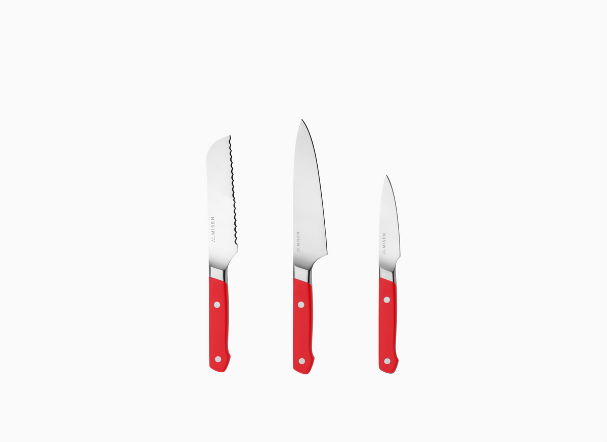 The Misen Minis set (shown in red) comes with a 5 inch Short Serrated knife, a 5.5 inch Utility Knife and a 3.5 inch Paring Knife