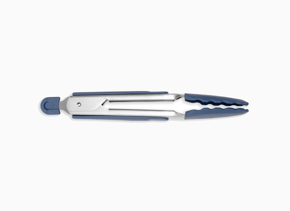 Small Blue Misen Silicone Tongs in a closed position, seen from the side on a seamless white background.