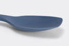 Close view of Blue Misen Spoontula head, showing its curve with enough depth to spoon liquid.