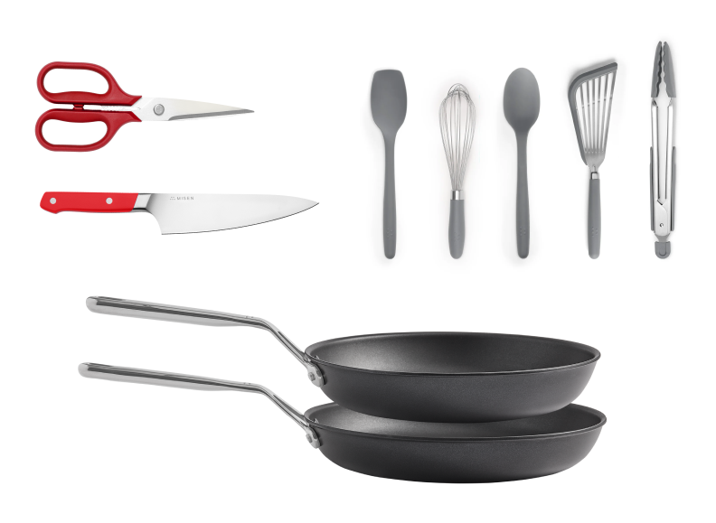 The Everyday Collection Set comes with red Kitchen Shears, a red 6.5 inch Chef Knife, a 10 inch Nonstick Pan and a 12 inch Nonstick Pan