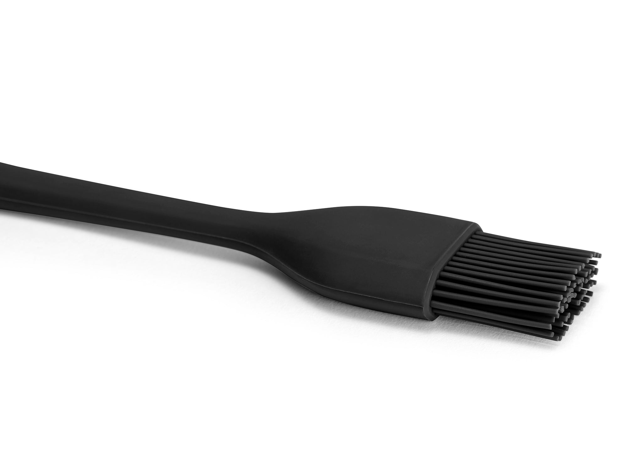 View of Black Misen Pastry Brush head with silicone bristles on a white background.