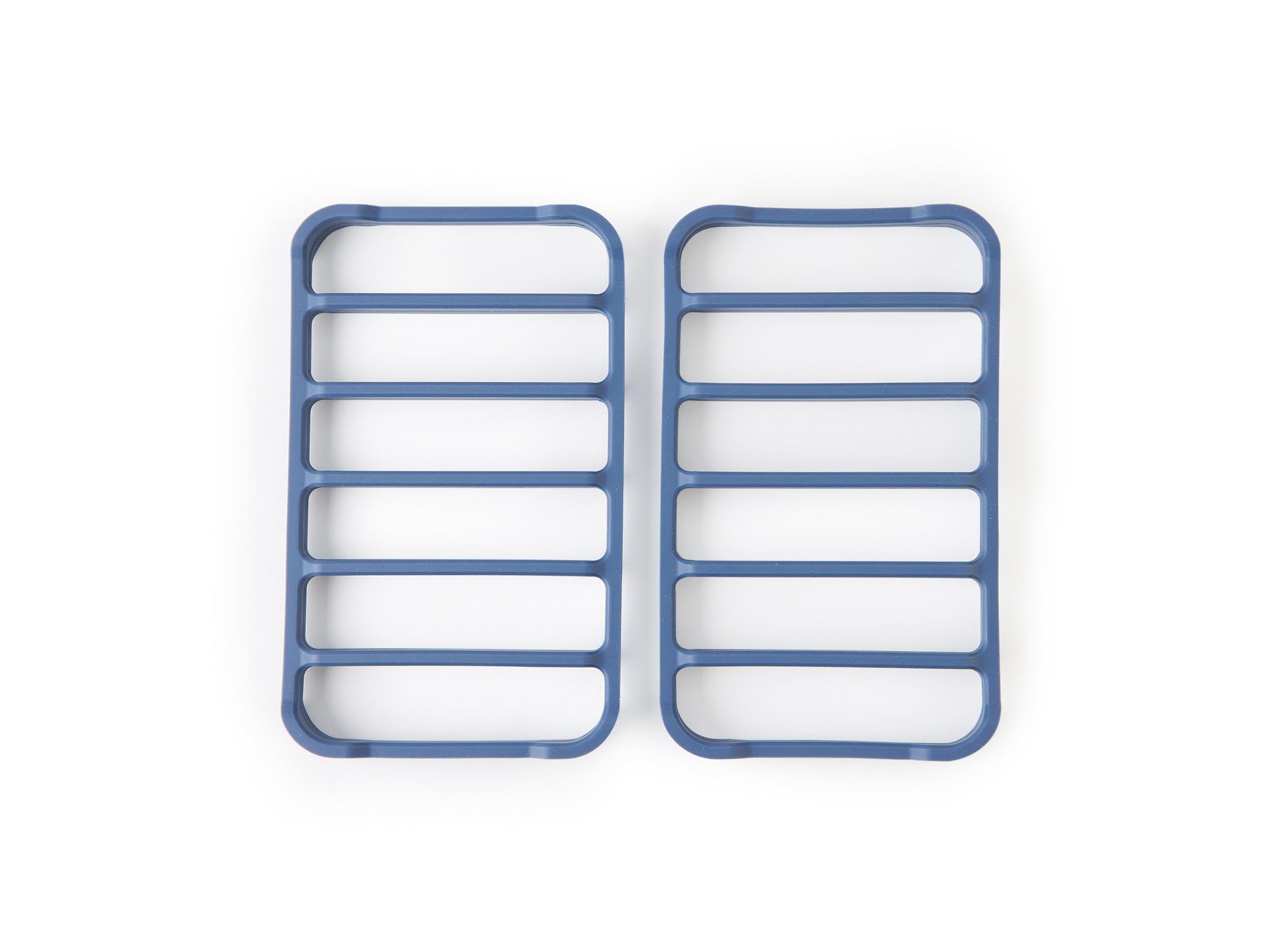 A bird's eye view of two blue Misen Silicone Roasting Racks side by side, on a white background.