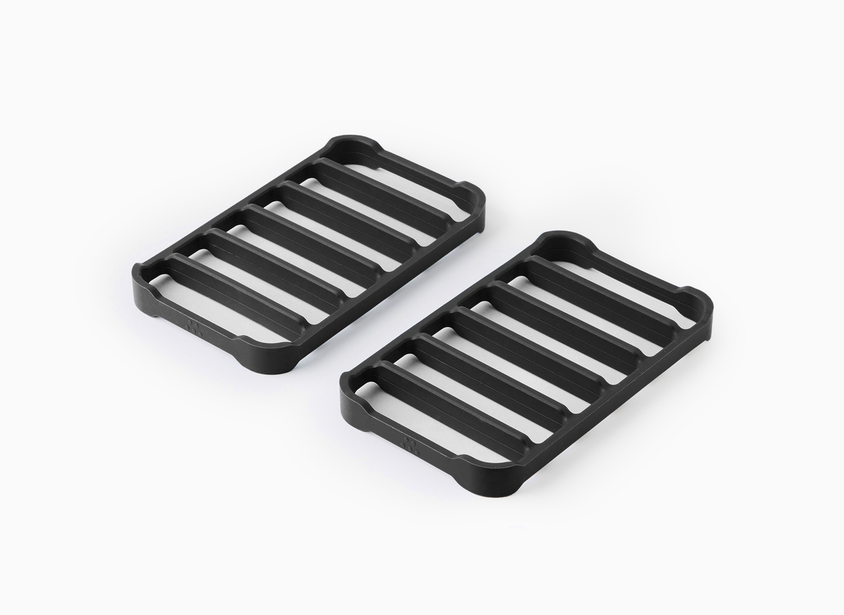 A top view of two black Misen Silicone Roasting Racks at an angle, laying side by side.