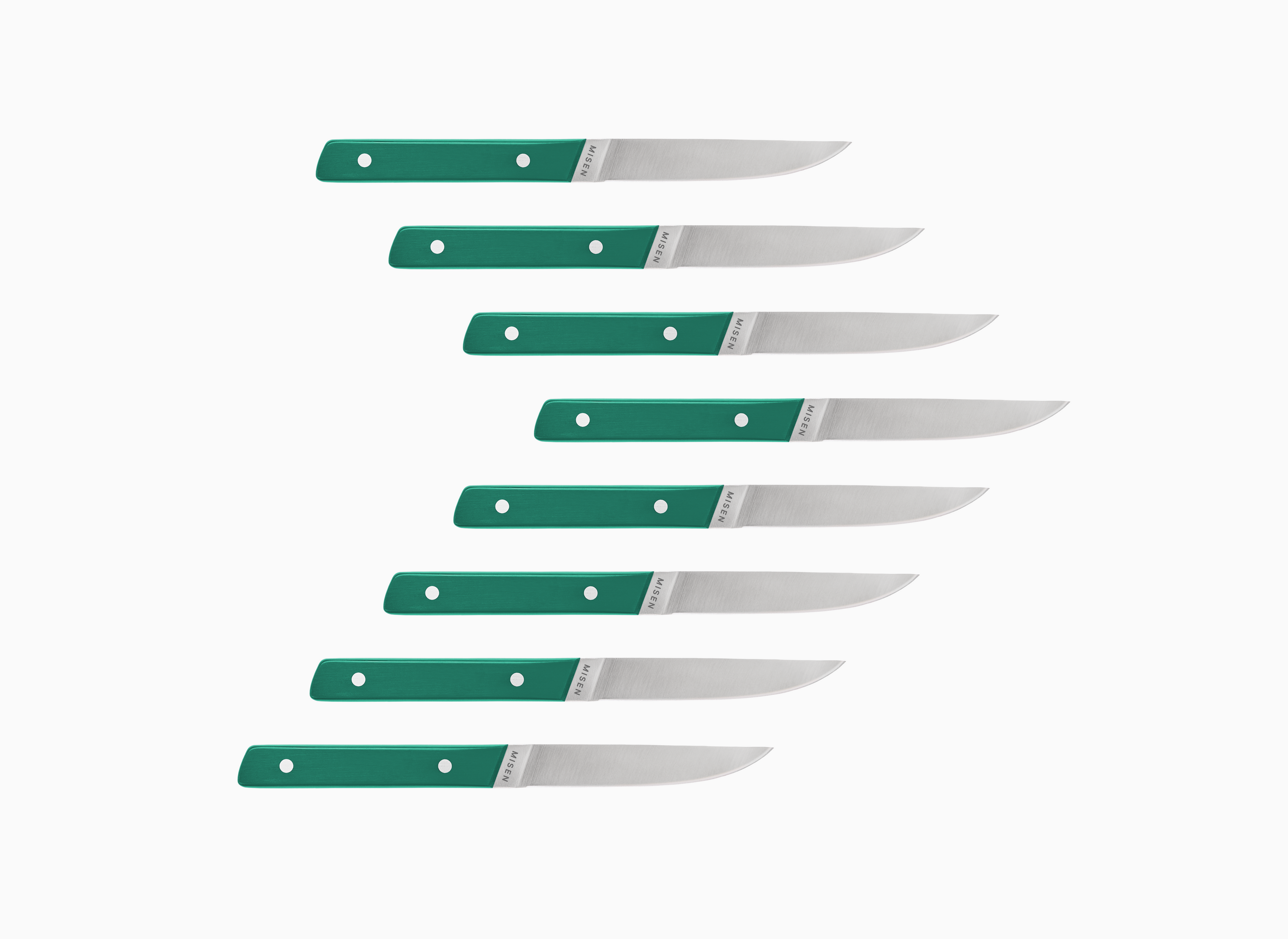 Set of eight straight edge Misen ACUTO steak knives with green handles on a white background