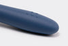 Close view of Blue Misen Whisk’s silicone handle, with raised Misen logo visible, on white background.