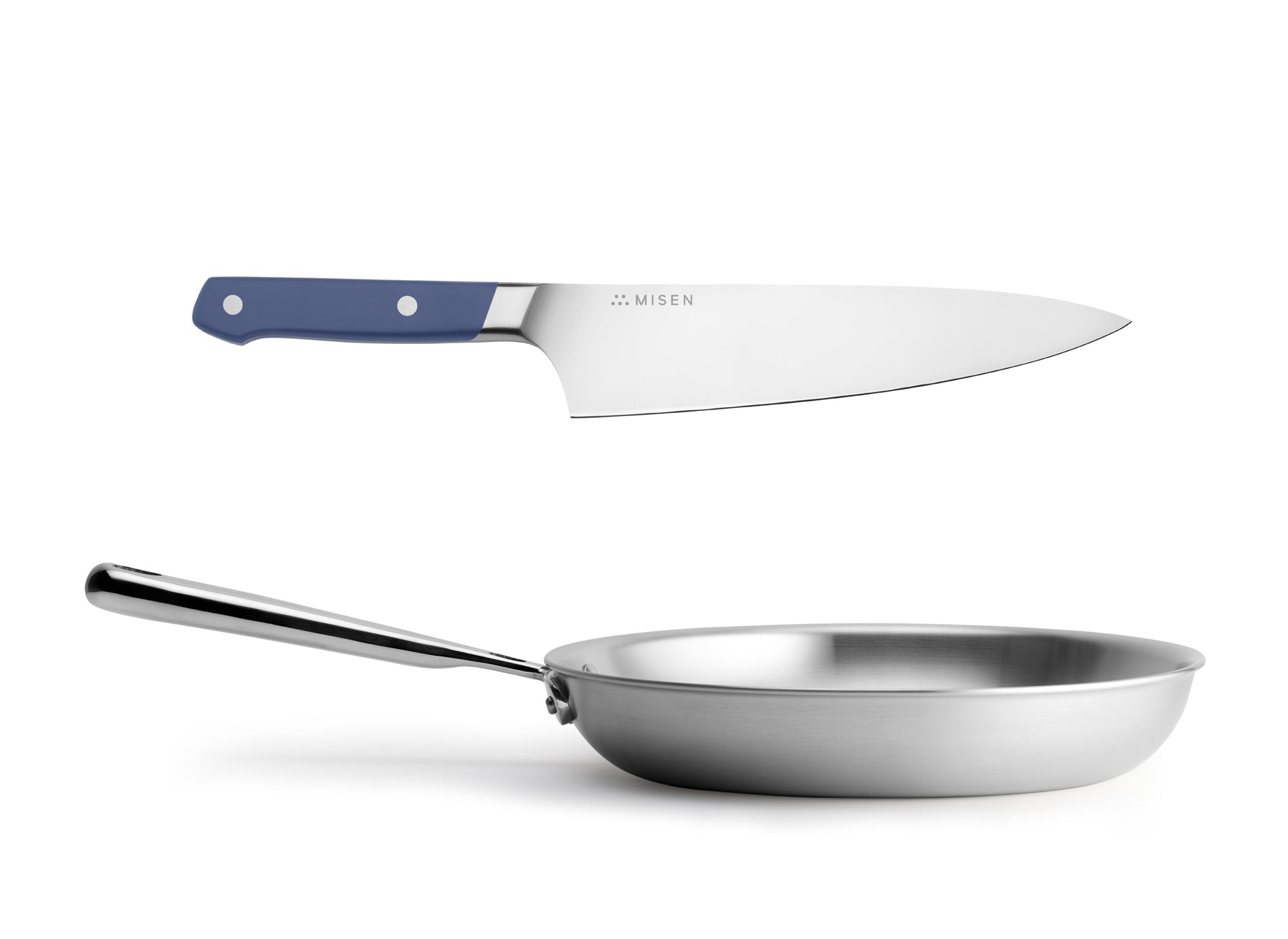 The blue Misen Chef's Knife & 10 inch Skillet Bundle is an essential workhorse in any kitchen.
