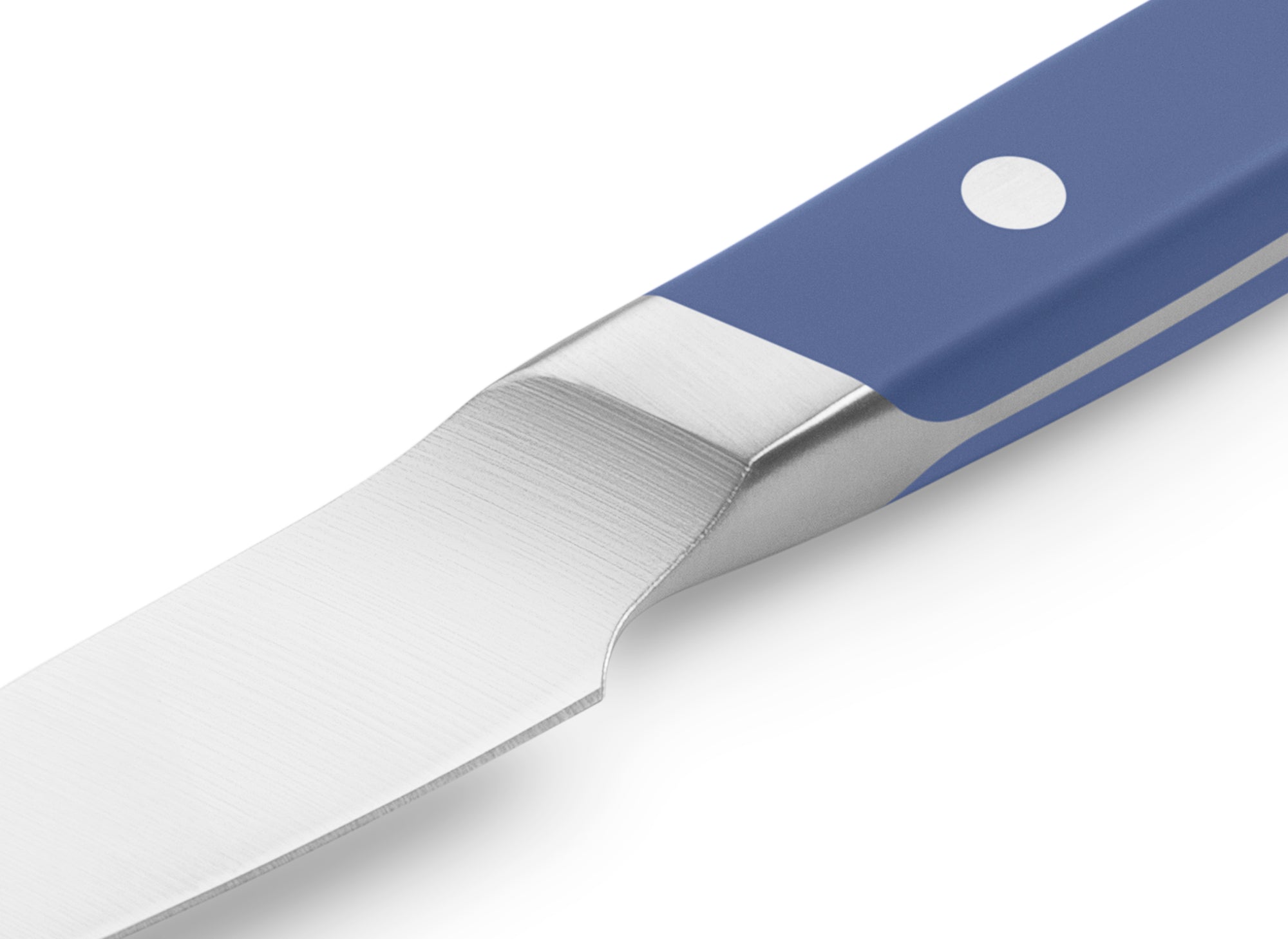 The Misen Paring Knife in blue features a unique sloped bolster.