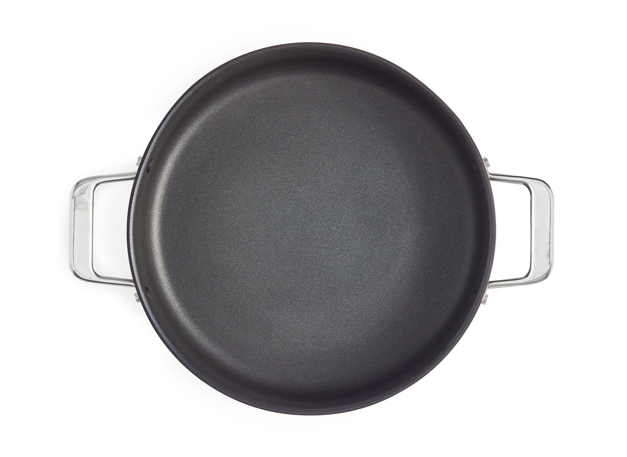 A bird’s eye view of the Misen Nonstick Rondeau with lid off, on a white background, with full view of the base of the pot.