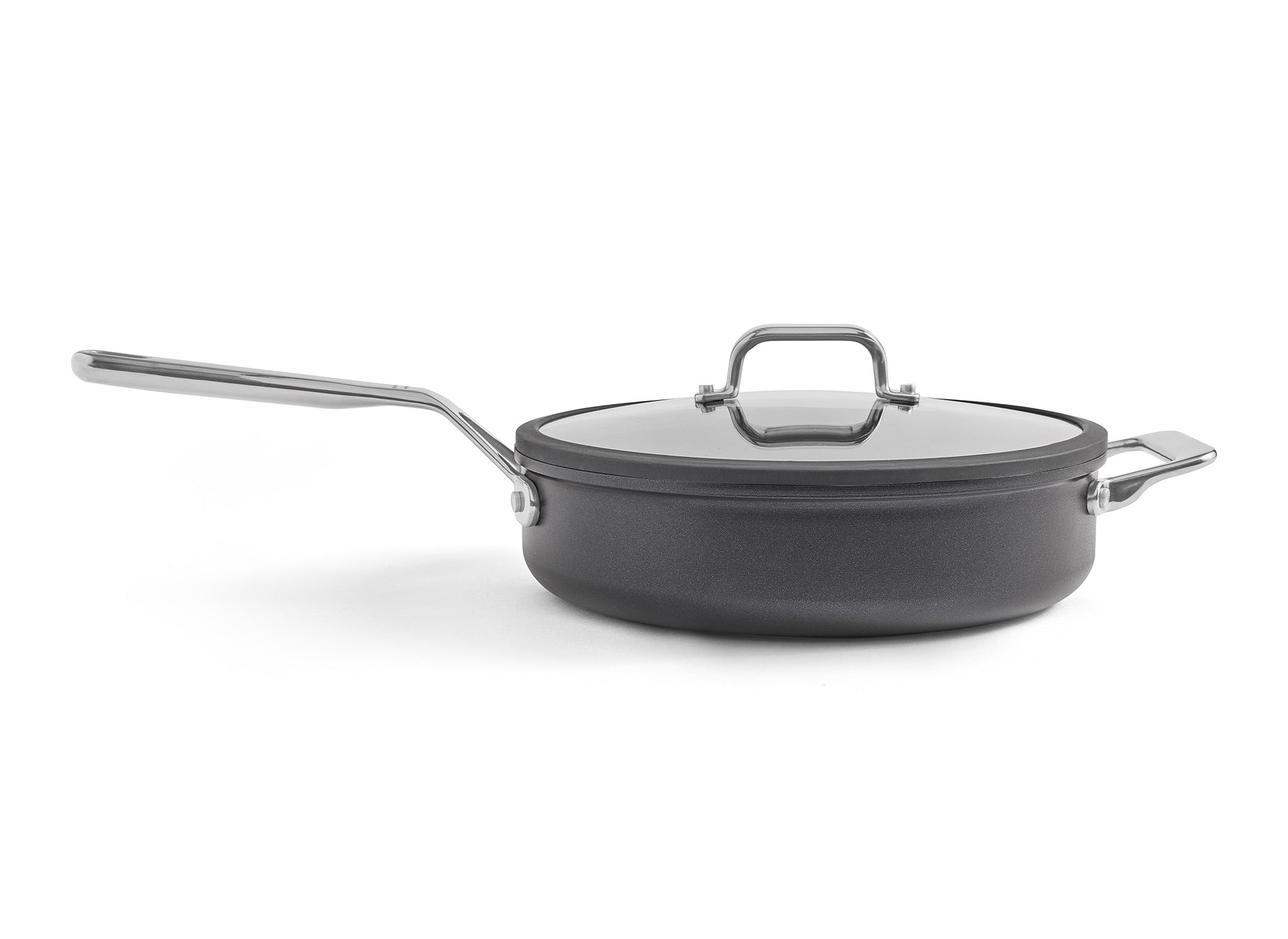 A sideways view of the Misen 3 QT Nonstick Sauté Pan, with lid on, on a white background.