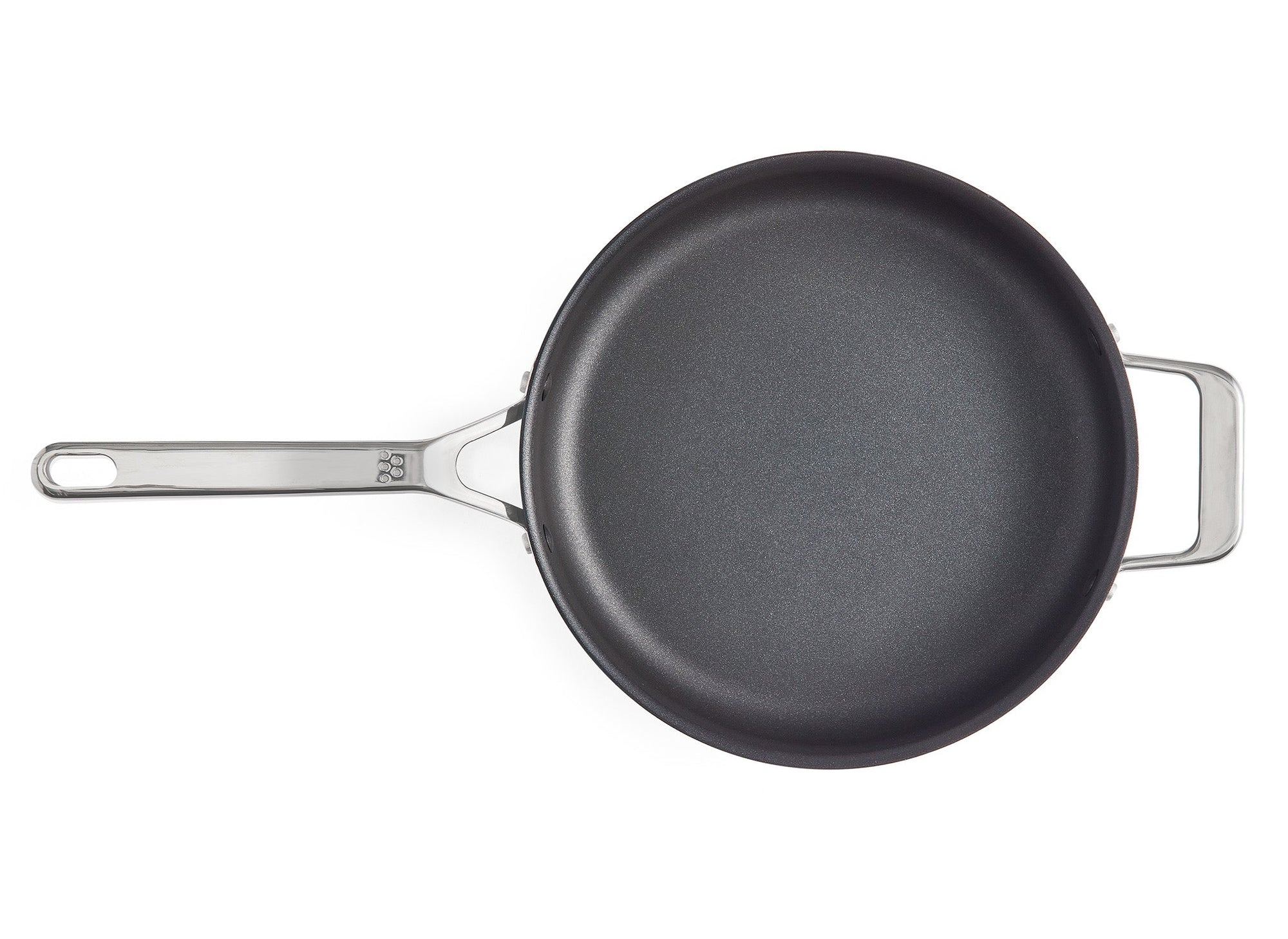 A bird’s eye view of the Misen 3 QT Nonstick Sauté Pan, with lid off, on a white background.