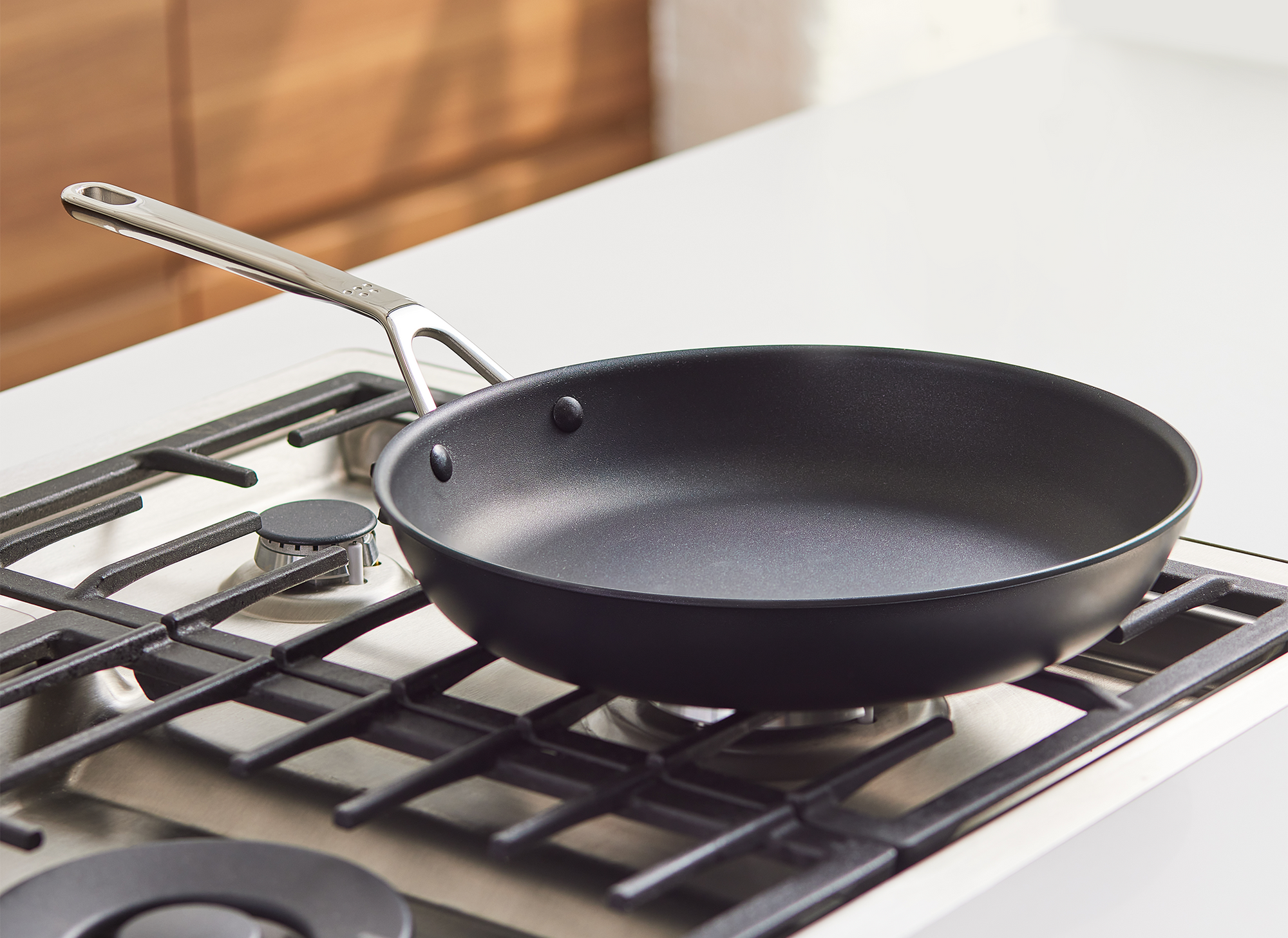 Cost of non stick pan deals