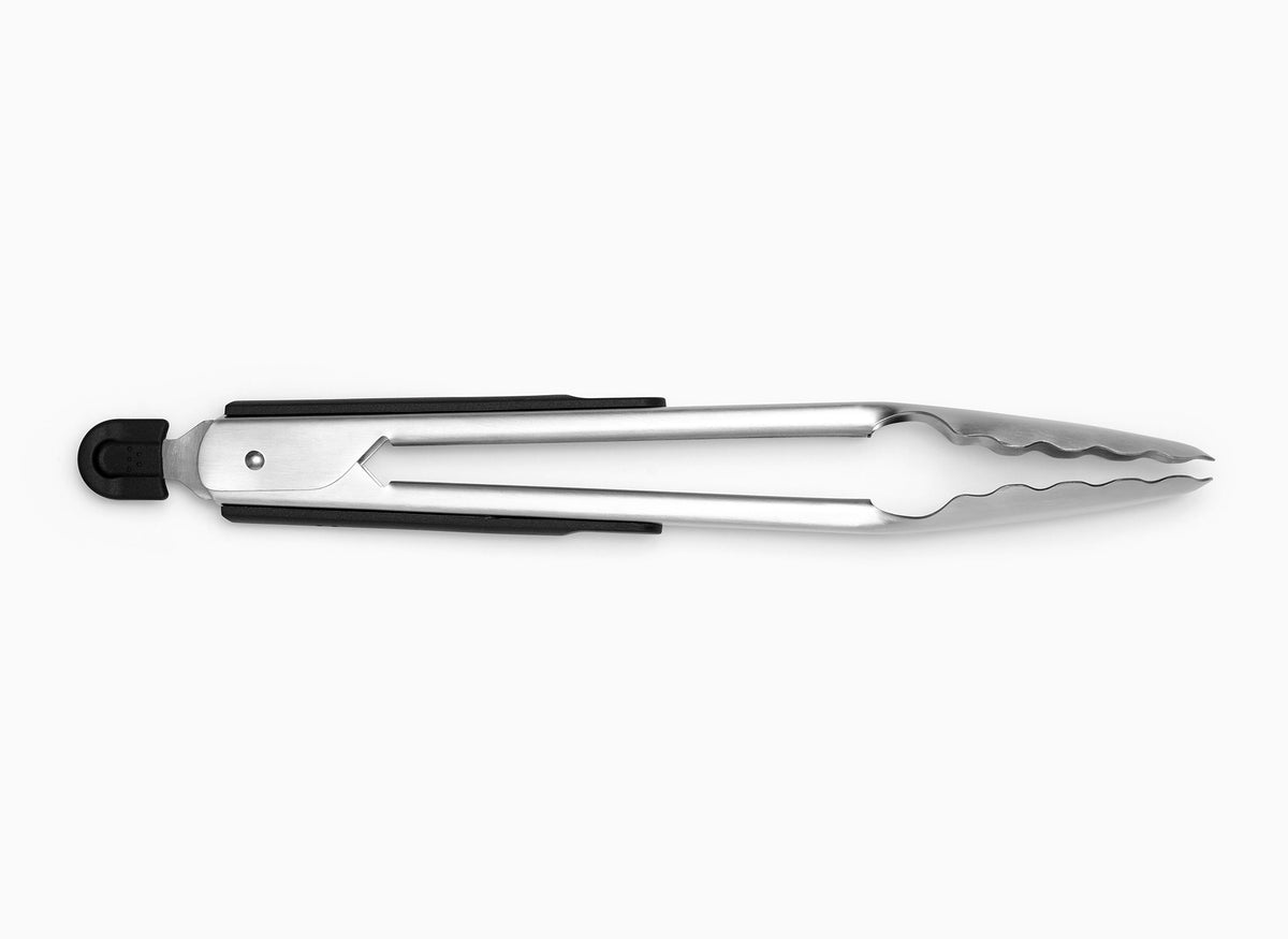 Black Misen Metal Tongs in a closed position,  seen from the side on a seamless white background.